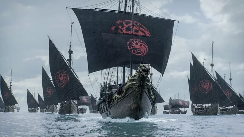 An armada of ships with black sails navigates the seas in Game of Thrones