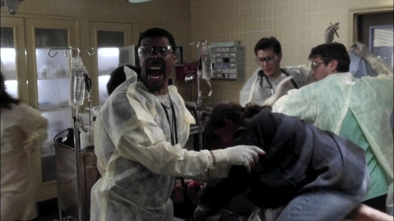 The ER ensemble handling a patient 