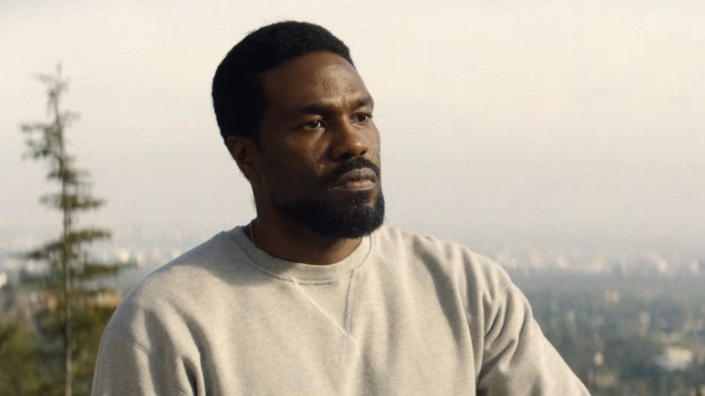 Simon Williams listening intently in 