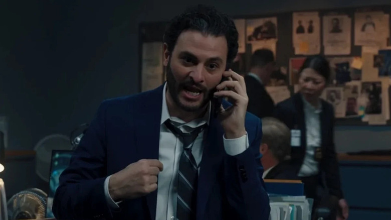 Agent Cleary speaking on a cell phone on Wonder Man