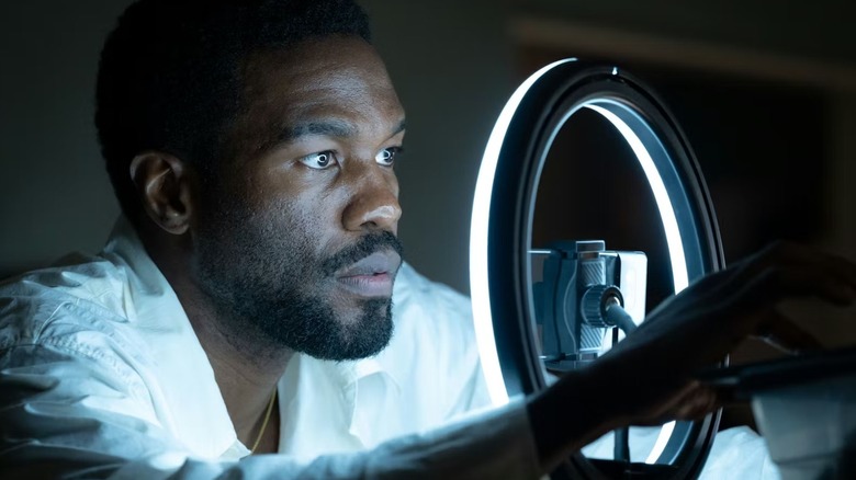 Simon Williams looking into a camera on 