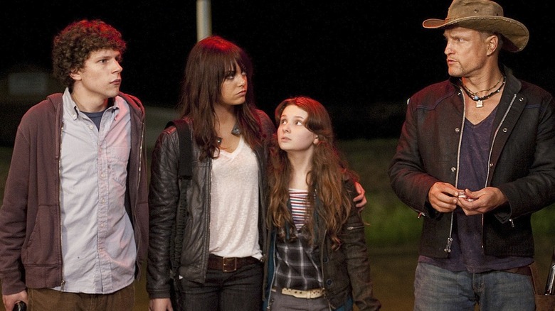Columbus (Jesse Eisenberg), Wchita (Emma Stone), Little Rock (Abigil Prisonen), and Talhaasi (Woody Harluson) stand together 