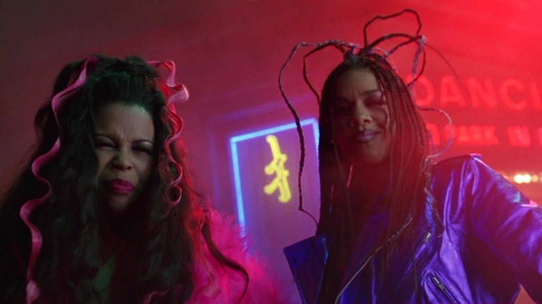 En Vogue's girls on the corner pulling faces in Batman Forever