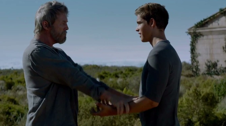 The Giver (Jeff Bridges) teaches Jonas (Brenton Thwaites) to access his power in The Giver