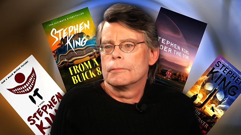 An emotionless Stephen King, surrounded by book covers for IT, From a Buick 8, Under the Dome, and The Dark Tower.
