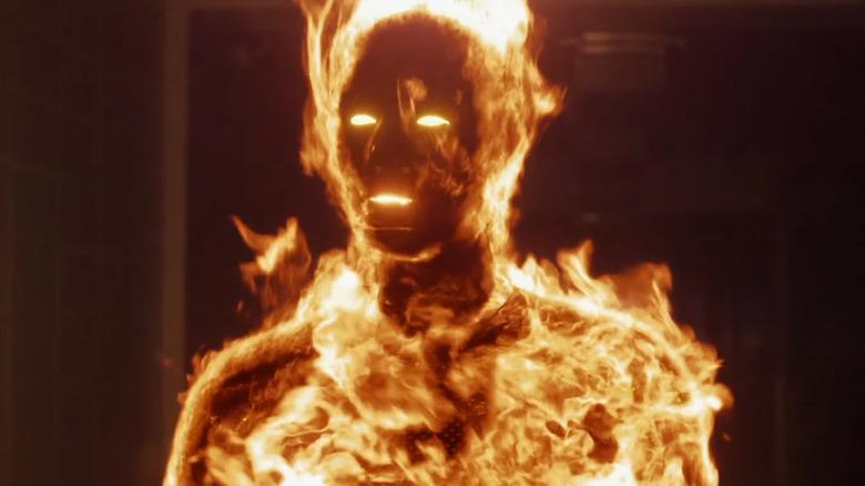 Michael B. Jordan as the Human Torch, burning in a lab in 2015's Fantastic Four