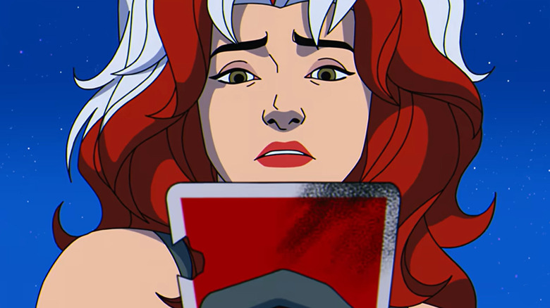 X-Men '97 - close-up of Rogue holding Gambit's burned card