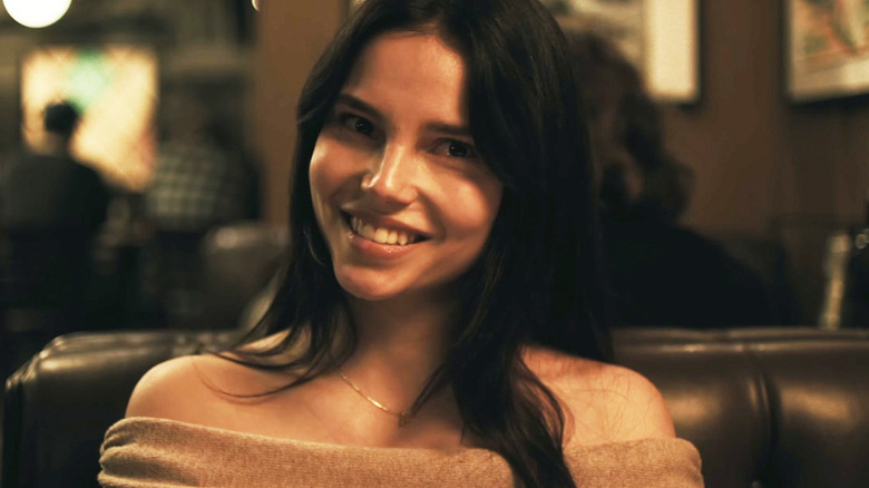 Inde Navarrette's Nikki smiles as she sits in a restaurant in Obsession