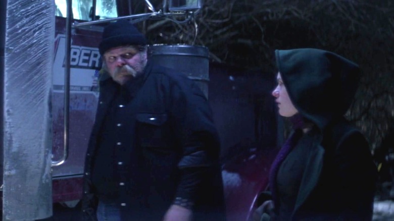 A truck driver dropping Marie off in a snowy locale in X-Men