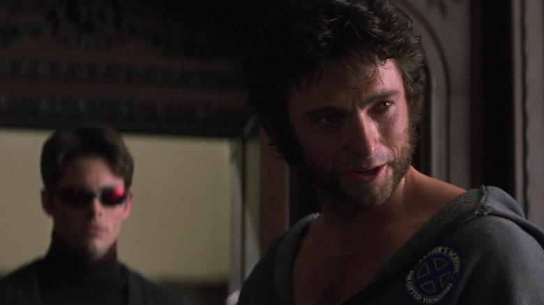 Hugh Jackman as Wolverine with James Marsden as Cyclops standing behind him in X-Men