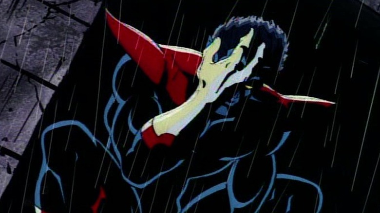 Close-up of Nightcrawler holding his face in the rain in X-Men: The Animated Series