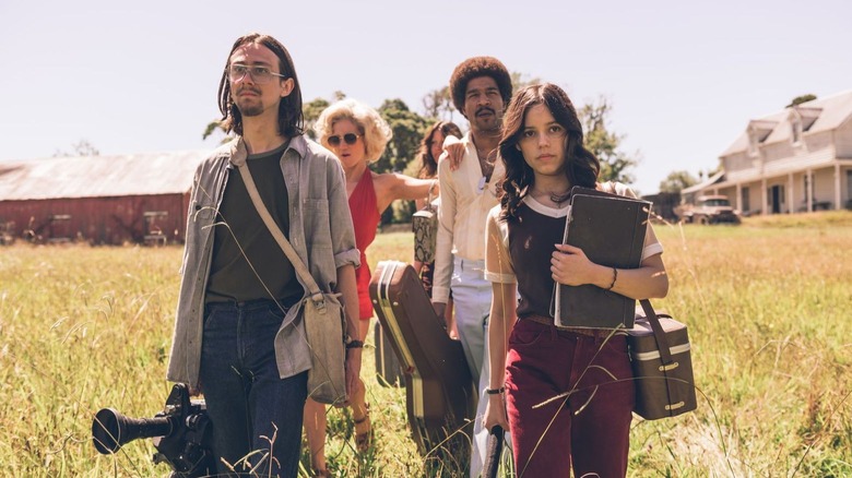 Group walks in field