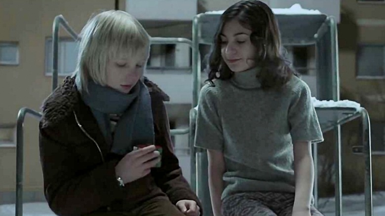 Lina Leandersson and Kåre Hedebrant in Let the Right One In