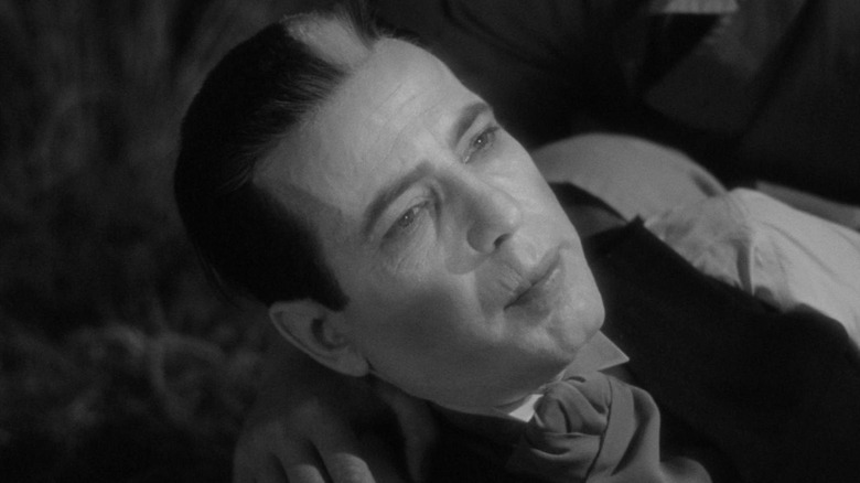 Humphrey Bogart as Dr. Kazavier in a straight position in the return of the doctor X