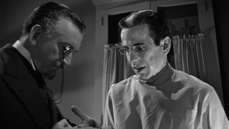 Humphrey Bogart as Dr. Kazavier talks to a colleague in the return of the doctor X