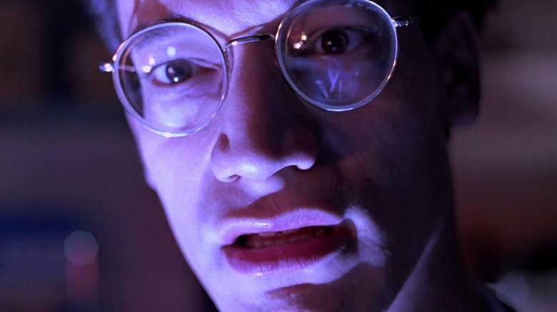 Ted Raimi as Rick looking in horrified surprise in Darkman
