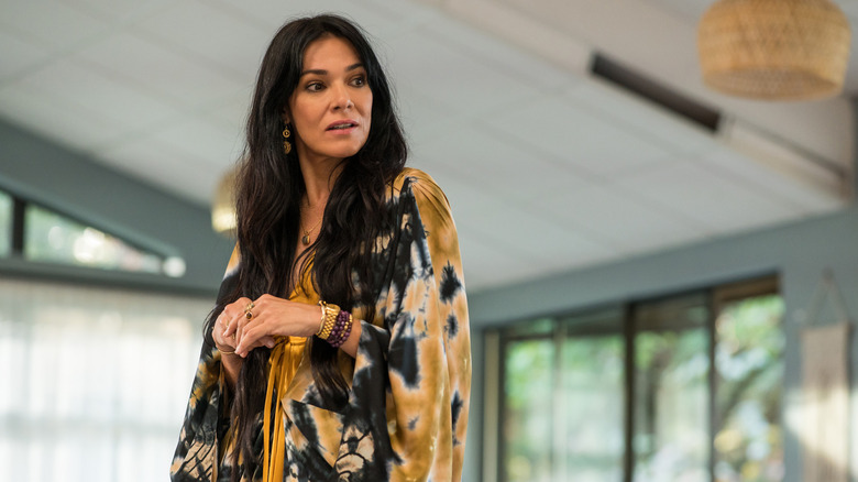 Yellowjackets season 2 Lottie standing in yellow robe