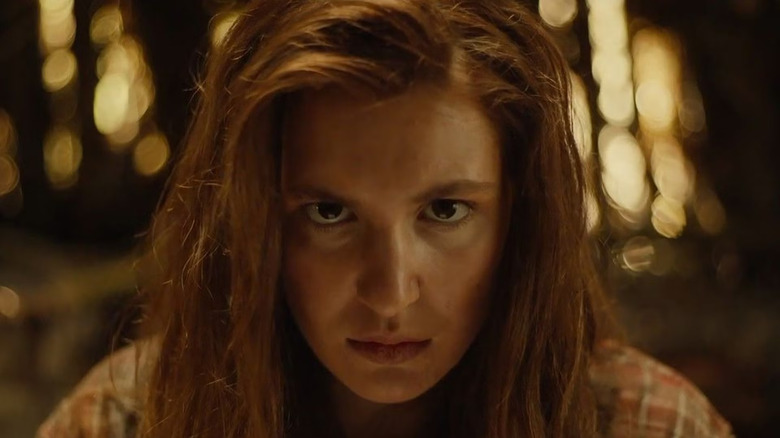 Sophie Nélisse as Shauna Shipman stares intensely into the camera with an angry scowl in Yellowjackets