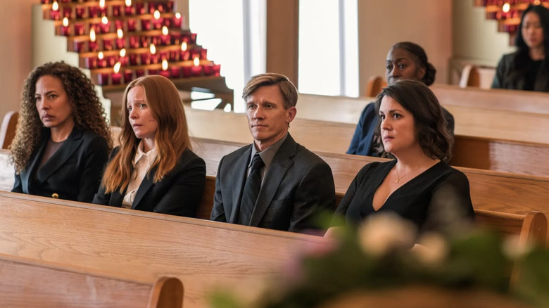 Yellowjackets: Tai, Van, Jeff and Shauna sitting in pew at Natalie's funeral