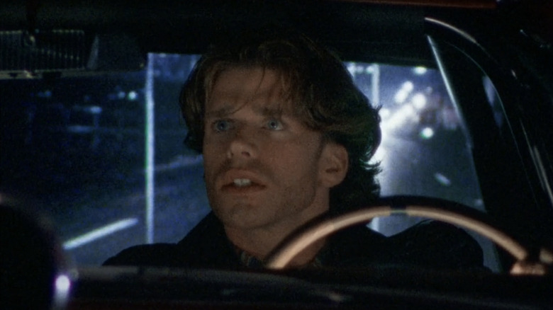 Taylor Sheridan while Vernon seems worried because he looks at his back mirror in Walker, Texas Ranger