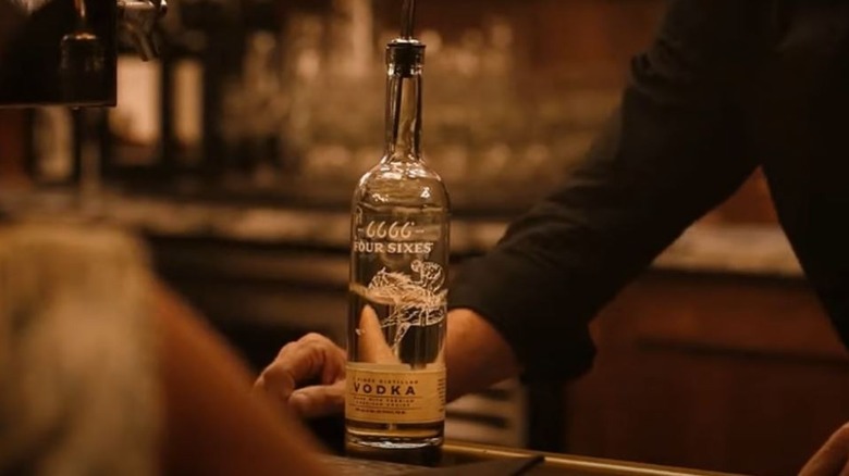 A bottle of Yellowstone Four Sixes vodka on a bar counter in Yellowstone