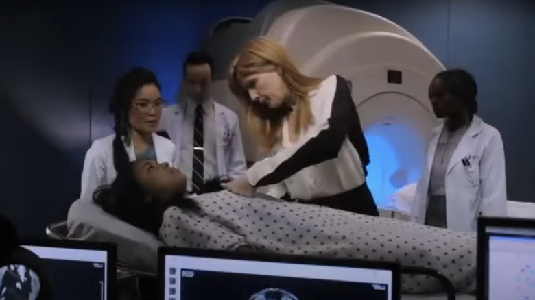 Kelly Reilly's Catherine Black examines a patient in hospital in Black Box
