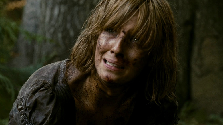 Jenny looking muddy and terrified in Eden Lake