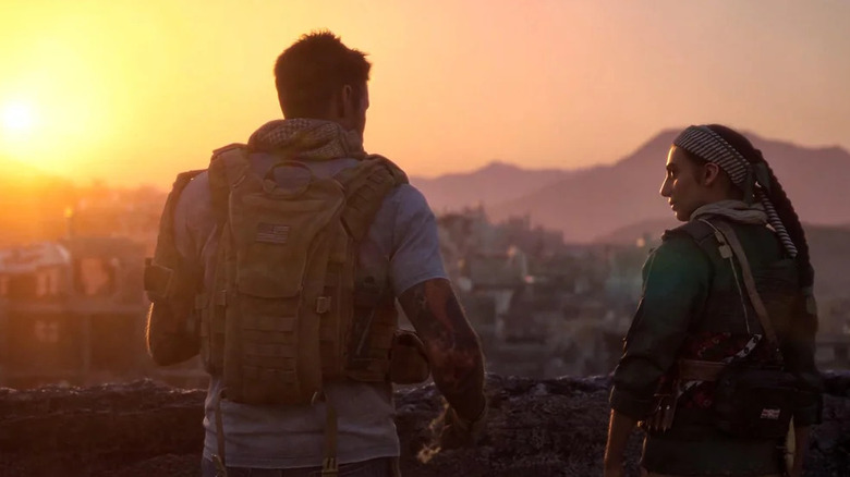 An image of two video game characters watching a sunrise in a small town in Call of Duty: Modern Warfare