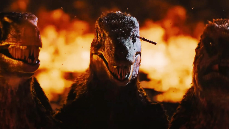 Raptors stands in front of the fire in primitive war
