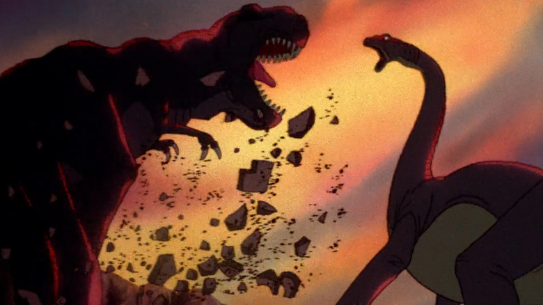 Littlefoot's mother battles Sharptooth in The Land Before Time