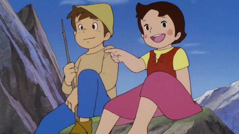 Heidi points at the distance while talking to her friend in Heidi, Girl of the Alps