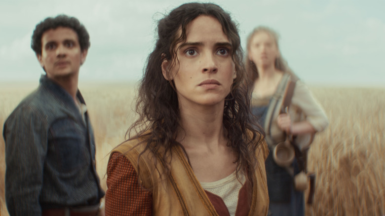 Wilmon and Bix watch in fear in front of a big field in Andor