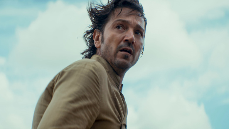 Cassian looks back sad and scared in Andor