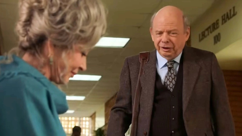 Sheldon's Meemaw and Dr. John Sturgis in the school hallway on Young Sheldon.