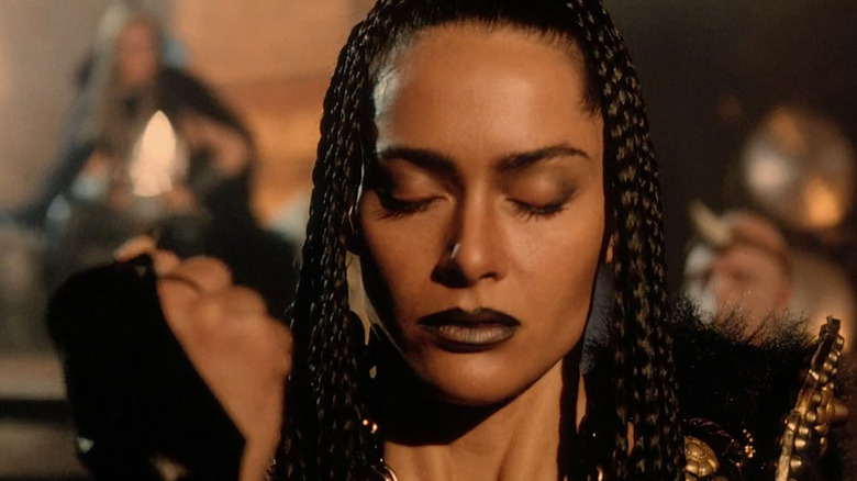 Sheeba Alahani as China raising a fist and concentrating in The Barbarians