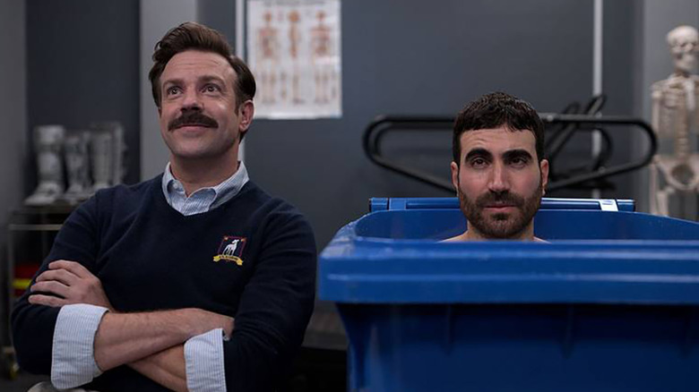 Ted and Roy in locker room