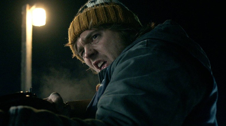 Bryan aims a gun in Resident Evil (2026)