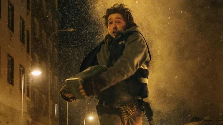 Bryan dodges falling monsters in Resident Evil (2026)