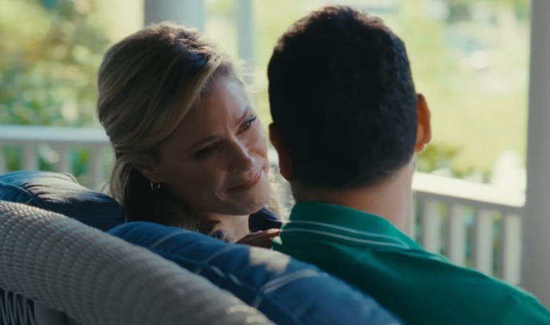 Virginia (Julie Bowen) smiles in Happy Sandler on a balcony in Happy Gilmore 2
