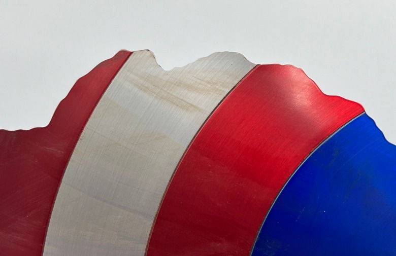 Scruff marks on Captain America's battle-damaged shield from Avengers: Endgame