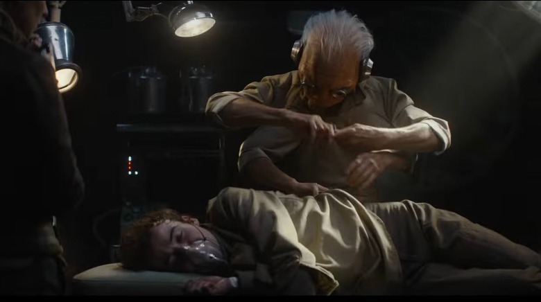 A four-armed alien tends to a new character in Andor