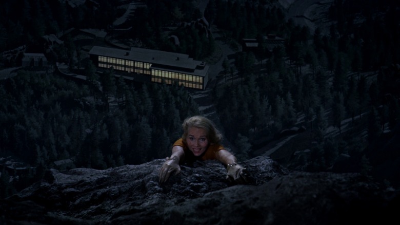 Eva Marie Saint as Eve Kendall hanging on the edge of Mount Rushmore