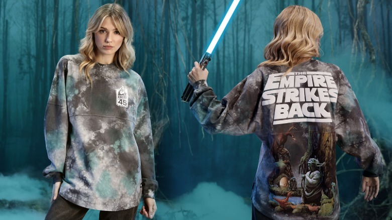 A woman in the Empire Strikes Back 45th Anniversary jersey sweatshirt