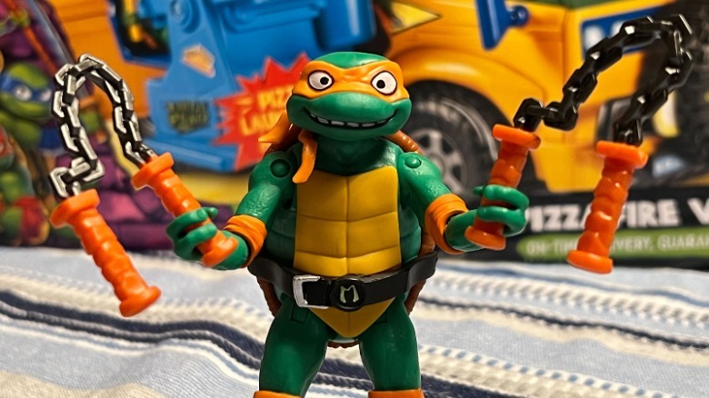 Figuras de ação TMNT: Mutant Mayhem Michelangelo