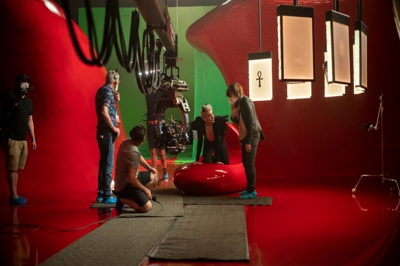 Mason Alexander Park as Desire and Director Louise Hopper in episode 110 of The Sandman