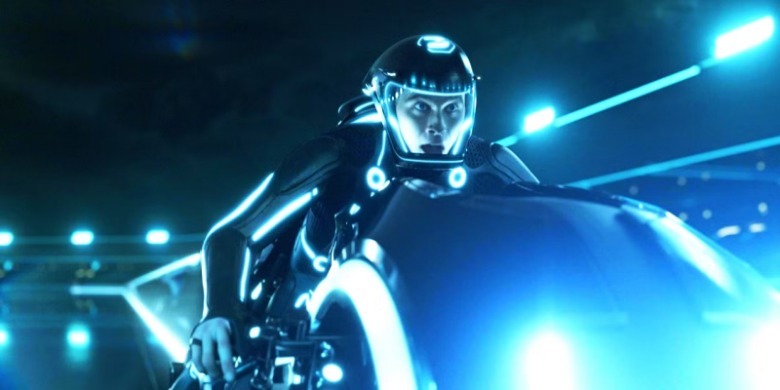 Garrett Hedlund as Sam riding a lightcycle in TRON Legacy