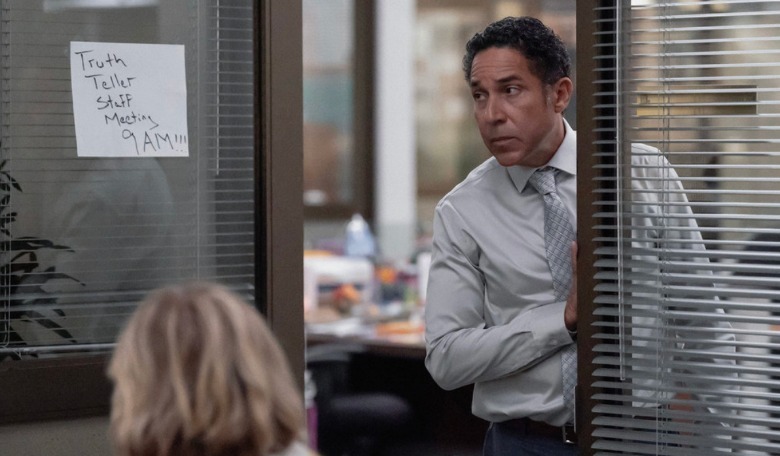Oscar (Oscar Nuñez peeks into a meeting in the conference room The Paper