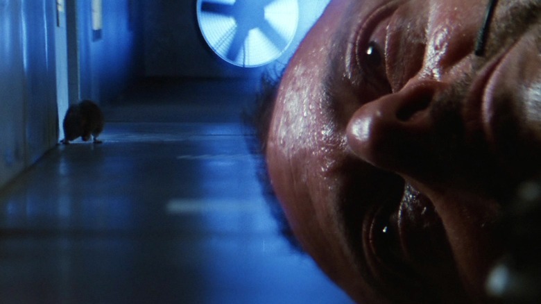 Jean Reno and a rat in Mission: Impossible