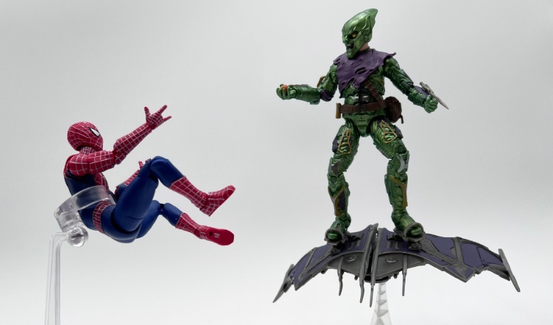 Marvel Legends Spider-Man: No Way Home Tobey Maguire's Spider-Man action figure jumping at Green Goblin on his glider