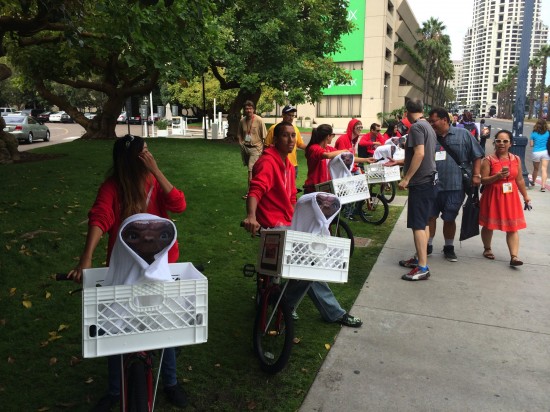 A line-up of ET's handing out Reese's Pieces to promote the X-Box Atari documentary